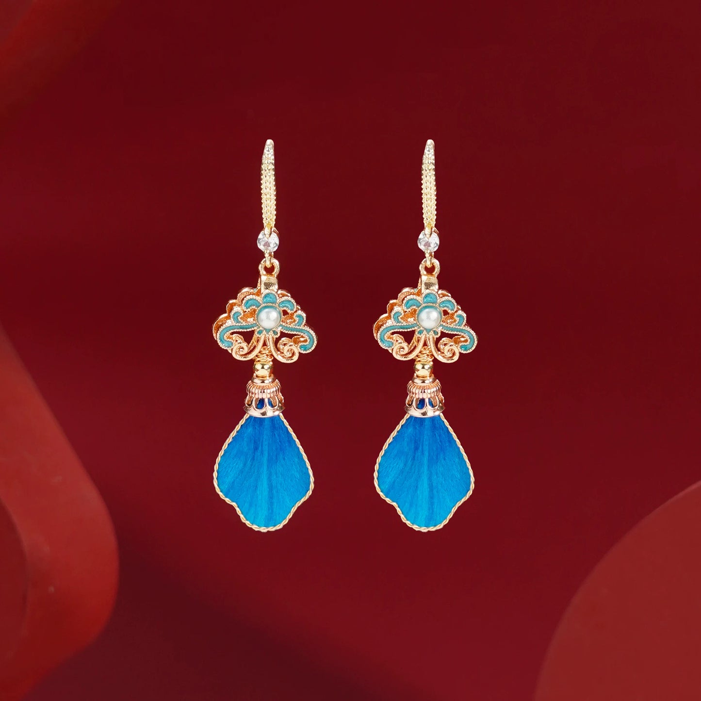 Eastculture  blue feathers earrings
