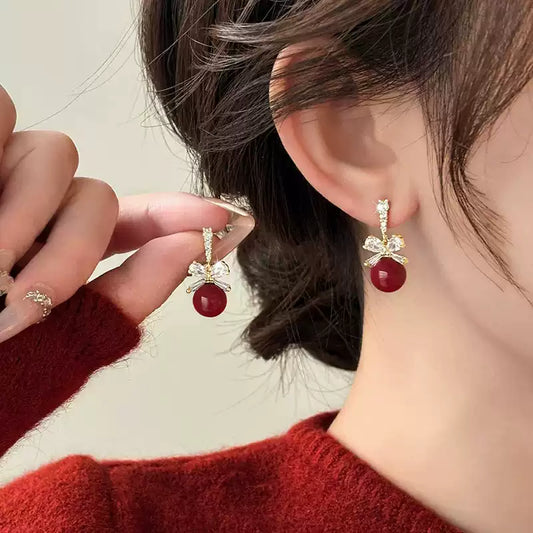 Eastculture Silver bow Earrings - Birth Month Guardian