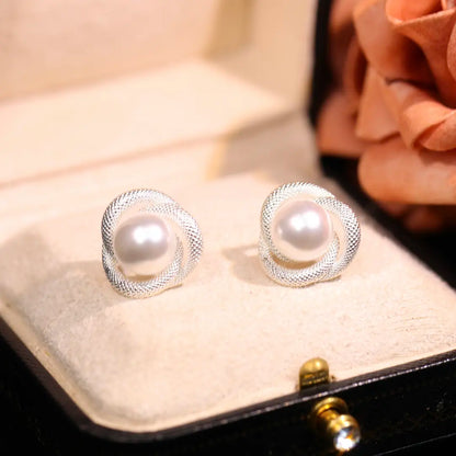 Eastculture  Rotating Pearl earrings